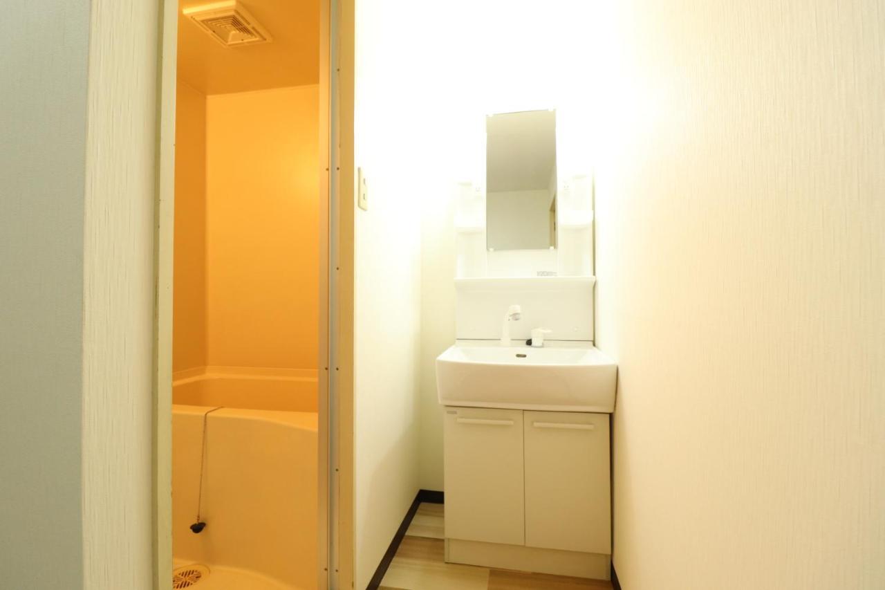 Court Saiwaicho Apartment Осака Екстериор снимка
